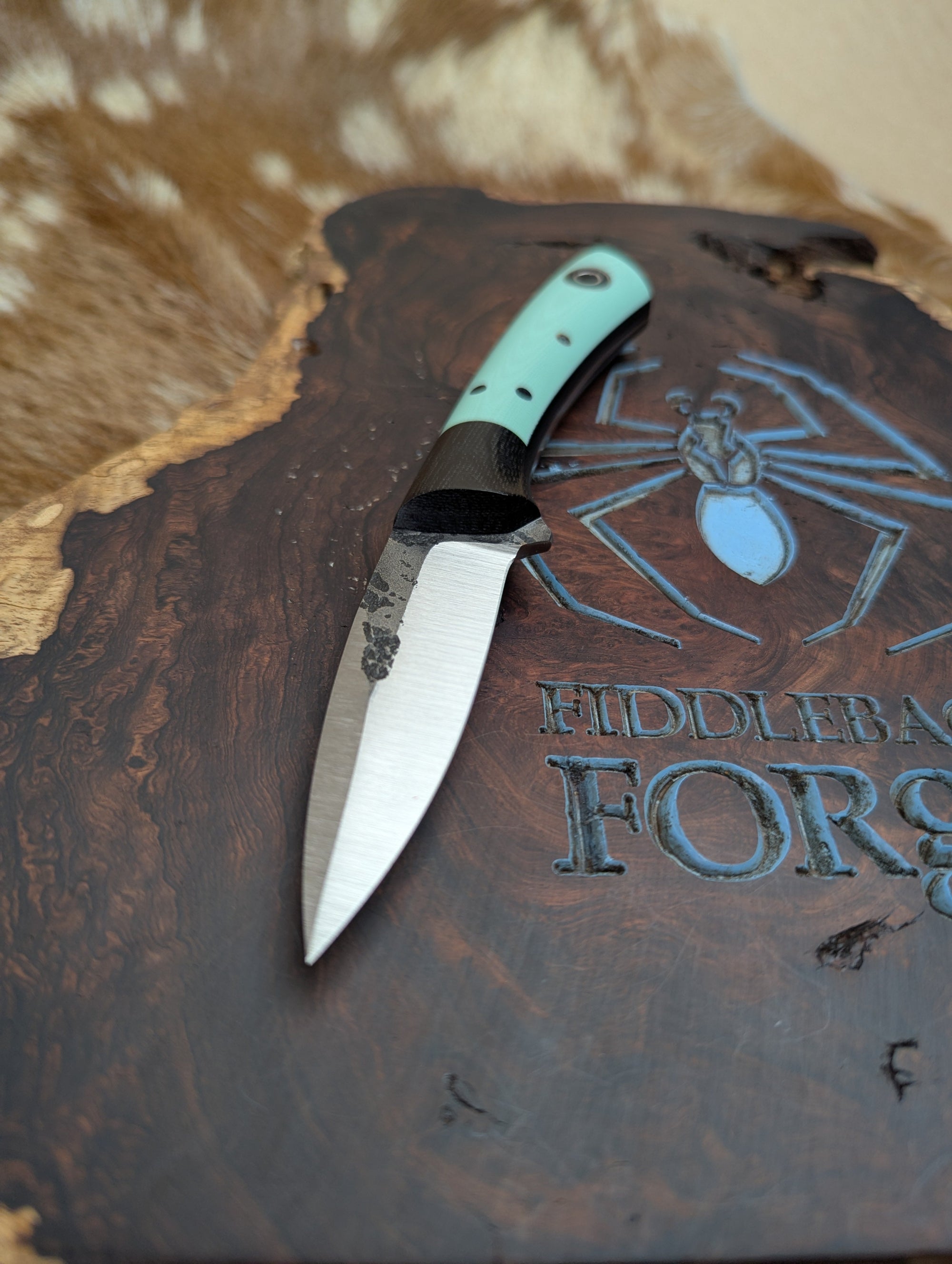 Bushboot -Bolstered Tiffany Blue G10 - Tapered Magnacut Steel