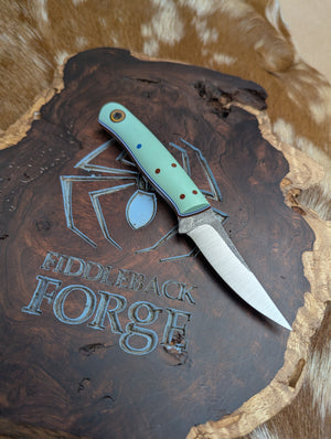 F2 (Fish and Fowl) w Tiffany Blue G10 on Magnacut