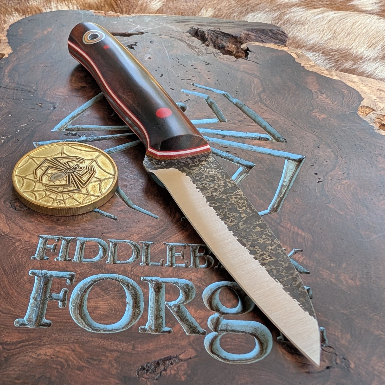 Fiddleback Forge Bushraptor