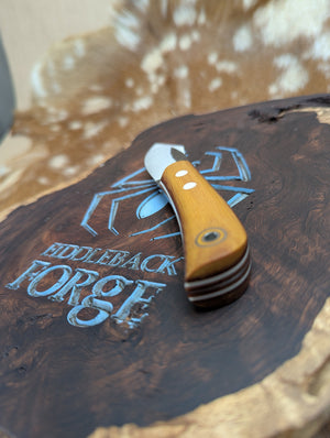Fiddleback Forge Sylvrfalcen - Vintage Canvas Micarta - Tapered A2 Steel
