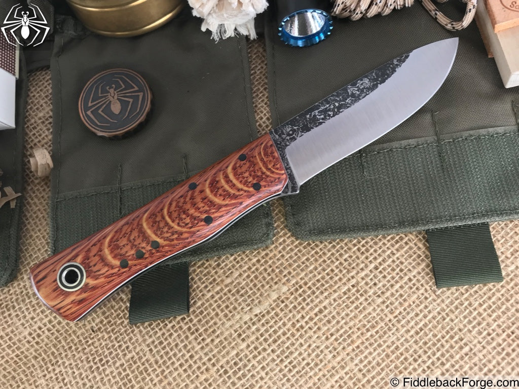 https://fiddlebackforge.com/cdn/shop/products/Fiddleback_Forge_-_Drop_Point_Renegade_-_Dyed_Curly_Oak_-_2_6888dd3e-c1a6-4c28-9a3c-62d5dc155e6a_2000x.jpg?v=1556742780